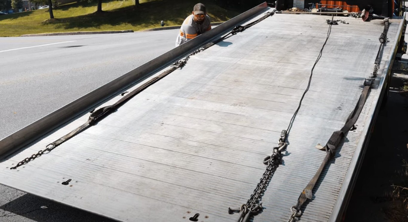 Professional flatbed tow truck ready for service in Reston, VA